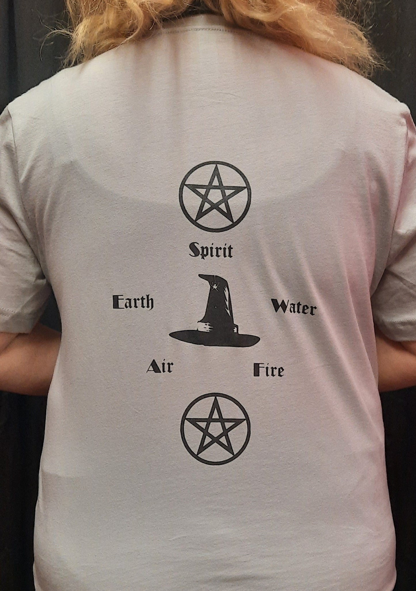 Bella Canvas short sleeve T-Shirt, size small.  "Wiccan" design on front.  Earth, Air, Fire, Water, Spirit design on back.