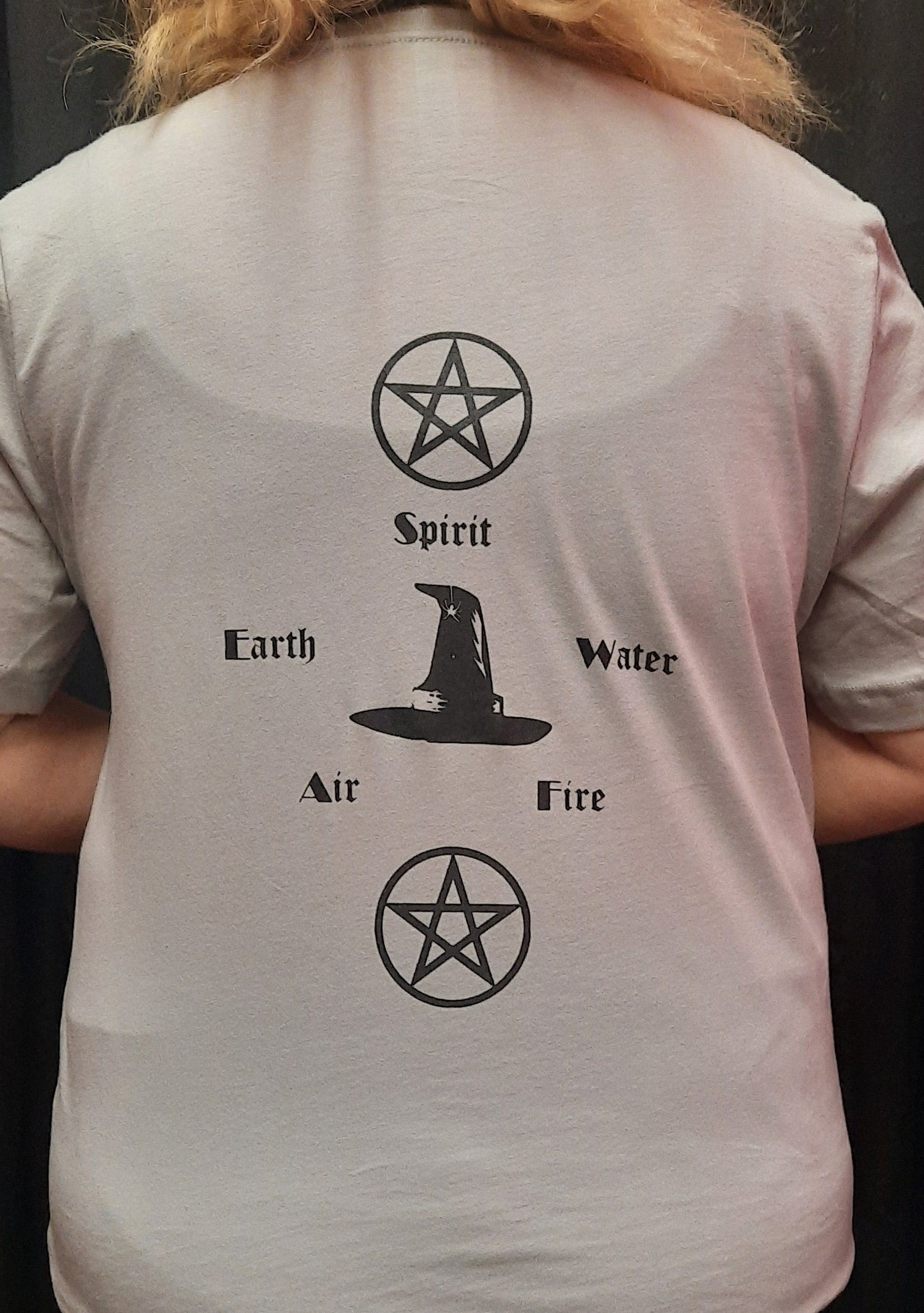 Bella Canvas short sleeve T-Shirt, size large.  "Wiccan" design on front.  Earth, Air, Fire, Water, Spirit design on back.
