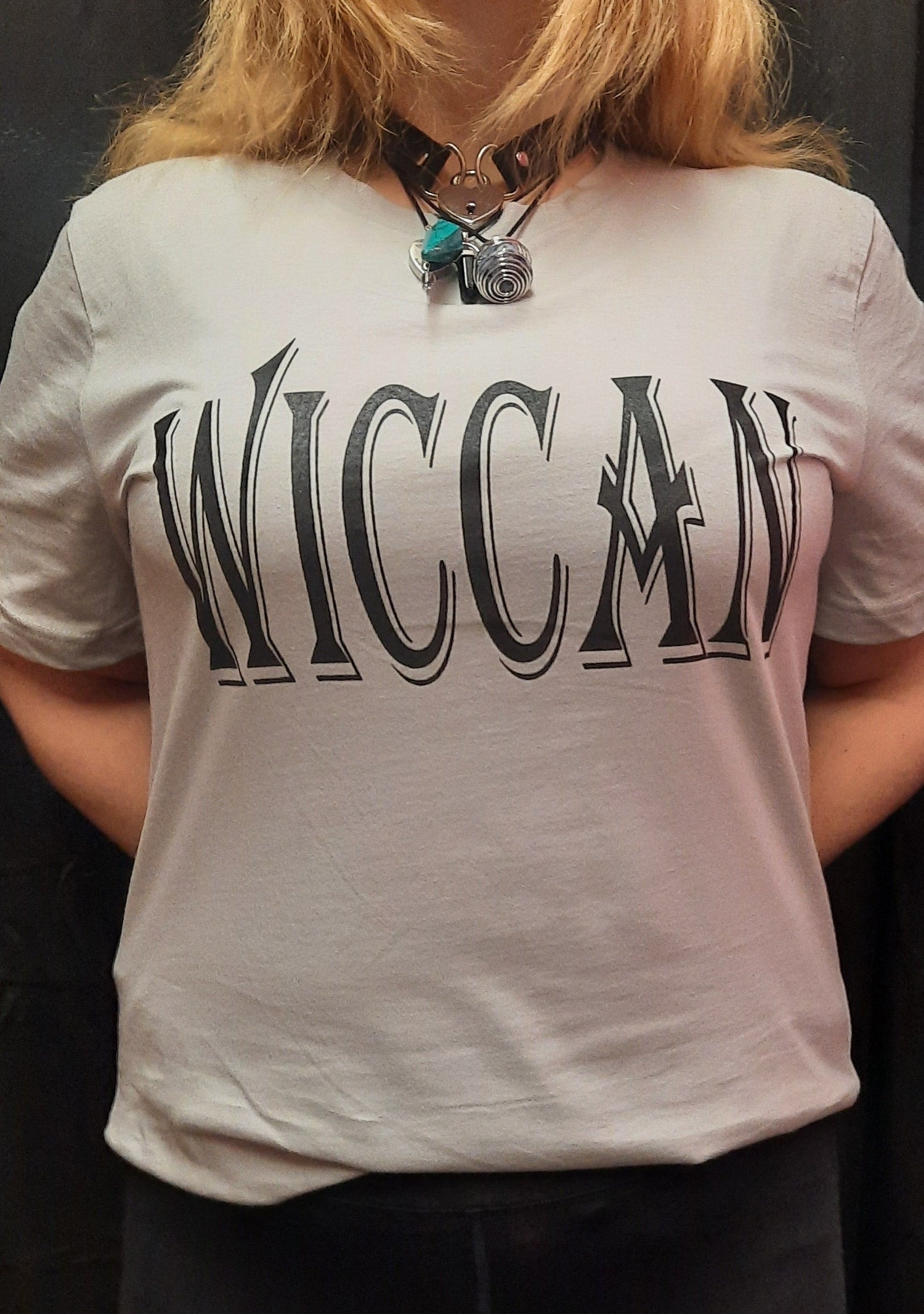 Bella Canvas short sleeve T-Shirt, size medium.  "Wiccan" design on front.  Earth, Air, Fire, Water, Spirit design on back.